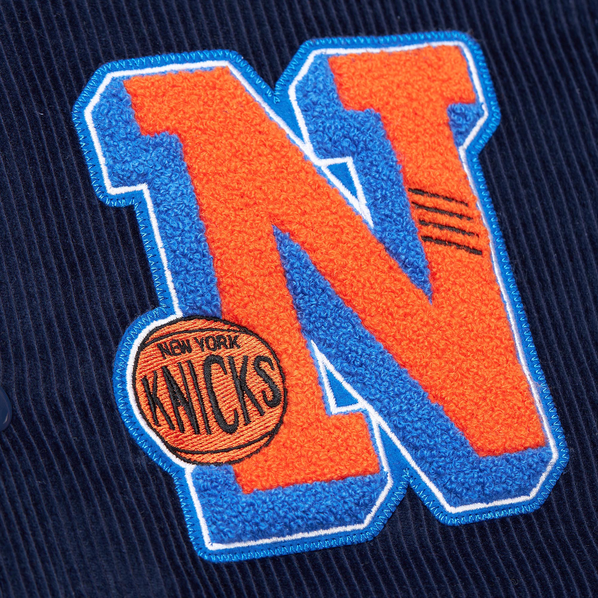 NBA COLLEGIATE VARSITY JACKET KNICKS